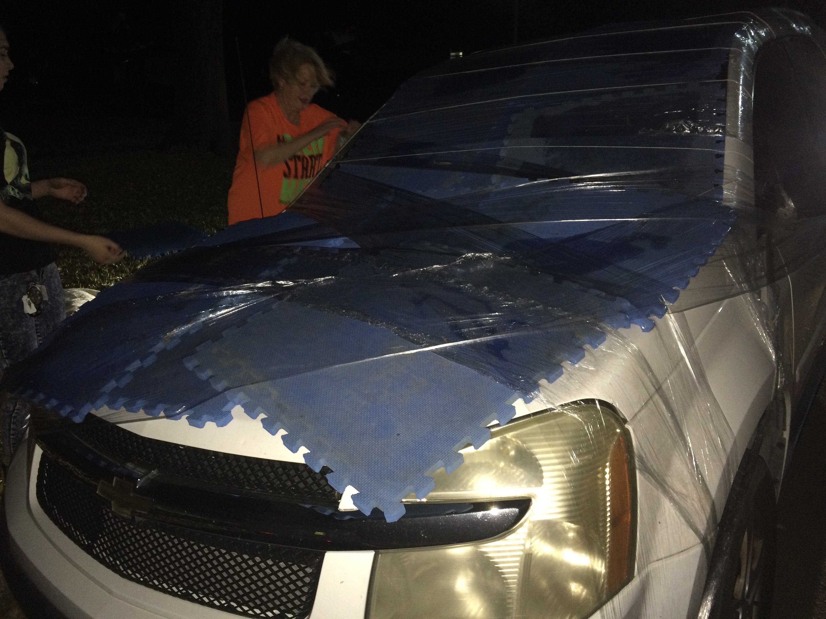 Car protection Saran Wrap and workout mats!