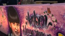 Mourners spent Monday evening at a special mural in Arlington that honors the Arlington girl whose abduction and murder led to the worldwide Amber Alert notification system to find missing children.