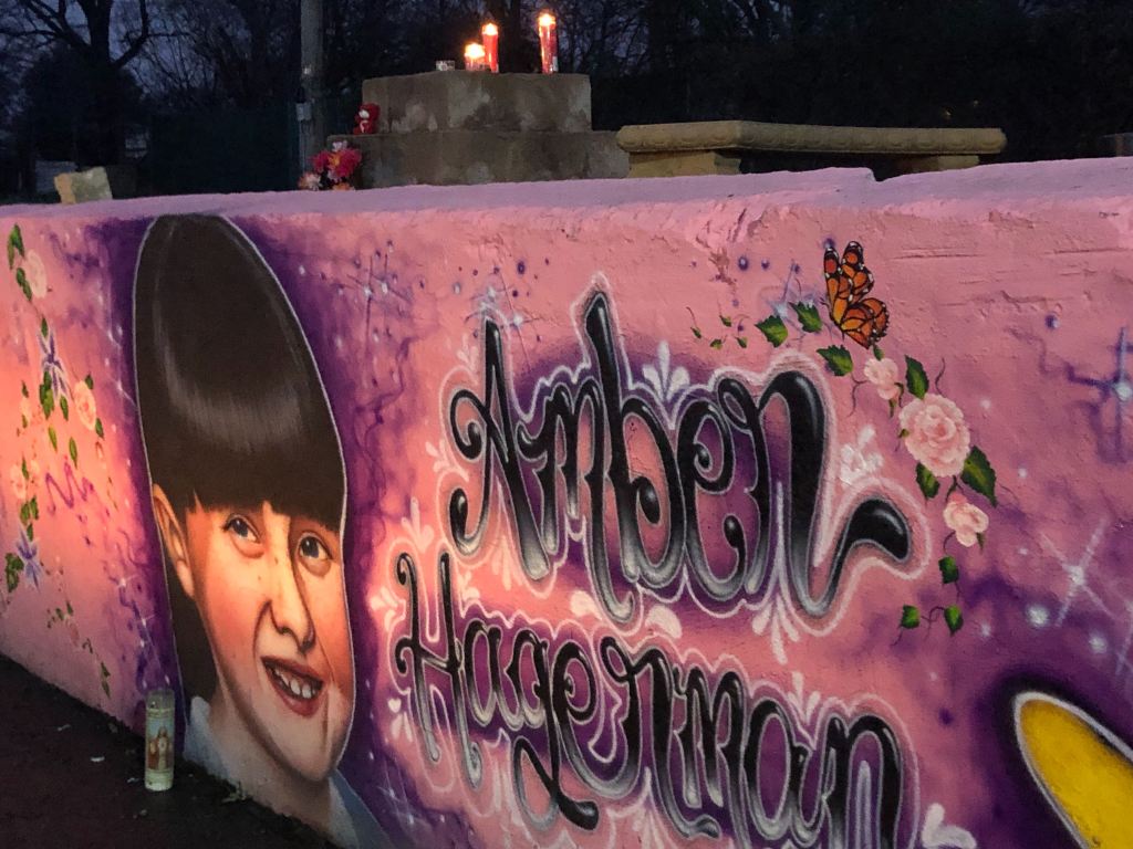 Mourners spent Monday evening at a special mural in Arlington that honors the Arlington girl whose abduction and murder led to the worldwide Amber Alert notification system to find missing children.