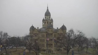 snow flurries at the denton county courthouse