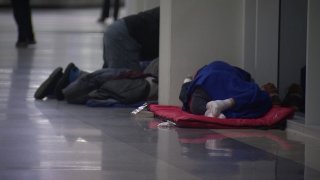 On recent cold nights, dozens of homeless people have been camping out in Terminal A, close to a DART station connecting the airport to Dallas.