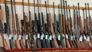 file photo of guns at a gun store