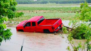IRVING FIRE RESCUES TRUCK IN SWIFT WATER