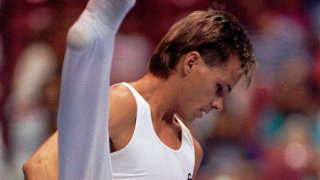 FILE - In this June 6, 1991, file photo, Kurt Thomas, 35, competes on the pommel horse at the U.S. Gymnastics Championships in the compulsory round in Cincinnati. Thomas, the first U.S. male gymnast to win a world championship gold medal, has died. He was 64. Thomas’ family said he died Friday, June 5, 2020. He had a stroke May 24, caused by a tear of the basilar artery in the brain stem.