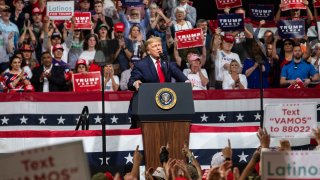 In this Feb. 19, 2020, file photo, President Donald Trump speaks at a rally at the Arizona Veterans Memorial Coliseum in Phoenix, Arizona.