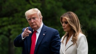 U.S. President Donald Trump and first lady Melania Trump arrive to the South Lawn of the White House after a trip to Baltimore, Maryland on May 25, 2020 in Washington, DC.