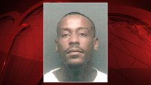 Maurice Kelso Smith, 28, is in custody facing a charge of capital murder of multiple persons, in addition to aggravated robbery and violating parole, police said Wednesday.