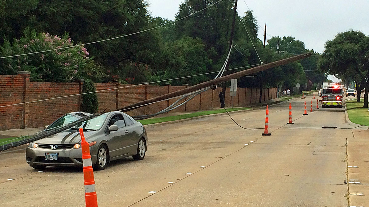 Driver Freed After Live Power Lines, Pole Crash Down on Car NBC 5