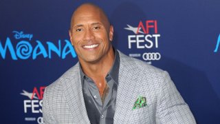In this Nov. 14, 2016, file photo, actor Dwayne Johnson arrives for the AFI FEST 2016 Presented By Audi - Premiere Of Disney's "Moana" held at the El Capitan Theatre in Hollywood, California.