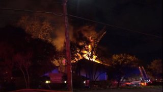 Firefighters arrived to find flames had engulfed a third-floor unit at Tealwood on the Creek in the 6000 block of Melody Lane.