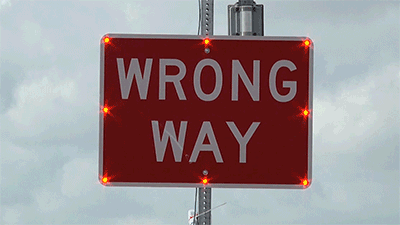 [Image: wrong-way-sign-motion.gif?fit=400%2C225]