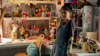 This image released by Netflix shows Momona Tamada portraying Claudia Kishi in a scene from the Netflix series "The Baby-Sitters Club"