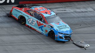 Bubba Wallace, driver of the #43 World Wide Technology Chevrolet, spins during the NASCAR Cup Series All-Star Open at Bristol Motor Speedway on July 15, 2020 in Bristol, Tennessee.