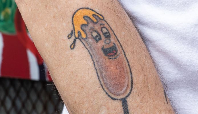 My weenie in his hot dog on a spool of thread By Liz at Oddity Tattoo in  Sarasota FL  rtattoos