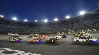 BRISTOL, TENNESSEE - JULY 15: Alex Bowman, driver of the #88 ChevyGoods.com/Adam's Polishes Chevrolet, Ryan Blaney, driver of the #12 BodyArmor Ford, Kevin Harvick, driver of the #4 Busch Light Apple Ford, and Kurt Busch, driver of the #1 Monster Energy Chevrolet, race during the NASCAR Cup Series All-Star Race at Bristol Motor Speedway on July 15, 2020 in Bristol, Tennessee.