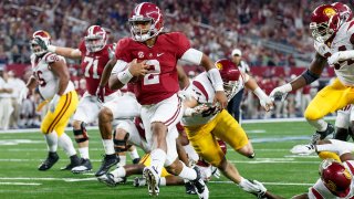 3 September 2016: Alabama Crimson Tide quarterback Jalen Hurts (#2) runs up the middle for a touchdown during the Advocare Classic college football game between the USC Trojans and Alabama Crimson Tide at AT&T Stadium in Arlington, Texas. Alabama won the game 52-6. (Photo by Matthew Visinsky/Icon Sportswire via Getty Images)