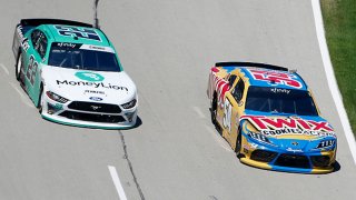 Kyle Busch, driver of the #54 Twix Cookies & Creme Toyota, races Austin Cindric, driver of the #22 MoneyLion Ford, during the NASCAR Xfinity Series Bariatric Solutions 300 at Texas Motor Speedway on July 18, 2020 in Fort Worth, Texas.
