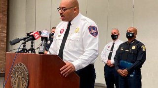 Southfield, Mich., Fire Chief Johnny Menifee holds a news conference on Wednesday, Aug. 26, 2020, in Southfield, Mich., in response to questions about a woman, Timesha Beauchamp, who was found alive at a funeral home.