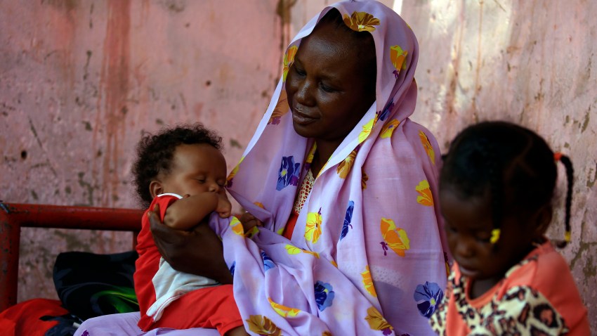 In this July 9, 2020, file photo, members of a Sudanese family beneficiary of a cash support system are pictured in Khartoum.