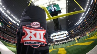 Detail view of Big 12 logo as the Baylor Bears band plays on the field before Baylor plays the Oklahoma Sooners in the Big 12 Football Championship at AT&T Stadium on Dec. 7, 2019 in Arlington, Texas.