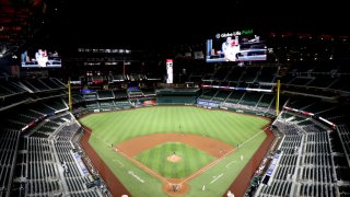 In this Aug. 10, 2020, file photo, Globe Life Field opens its roof before the MLB game between the Seattle Mariners and Texas Rangers at Globe Life Field in Arlington, Texas.