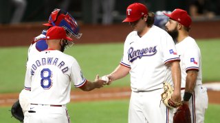 Texas Rangers relieve pitcher Ian Gibaut is taken out during the MLB game between the Seattle Mariners and Texas Rangers on August 10, 2020 at Globe Life Field in Arlington, TX.