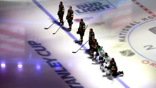 Players from the Vegas Golden Knights and the Dallas Stars kneel as the United States anthem is played before the start of their Western Conference Round Robin game during the 2020 NHL Stanley Cup Playoff at Rogers Place on August 03, 2020 in Edmonton, Alberta.