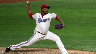 Edinson Volquez #36 of the Texas Rangers throws against the Seattle Mariners in the fifth inning at Globe Life Field on August 11, 2020 in Arlington, Texas. (Photo by Ronald Martinez/Getty Images)