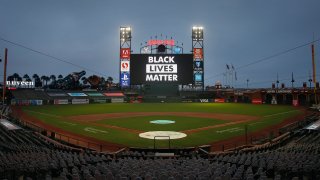 The words ‘Black Lives Matter’ are displayed on the digital screen after the postponement of the game between the San Francisco Giants and the Los Angeles Dodgers at Oracle Park on August 26, 2020 in San Francisco, California. Several sporting leagues across the nation today are postponing their schedules as players protest the shooting of Jacob Blake by Kenosha, Wisconsin police. (Photo by Lachlan Cunningham/Getty Images)
