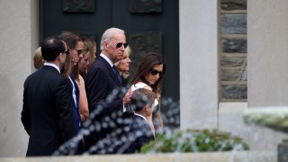 U.S. Vice President Joe Biden (C) arrives with family for a mass of Christian burial at St. Anthony of Padua Church for his son, former Delaware Attorney General Beau Biden, on June 6, 2015 in Wilmington, Delaware.