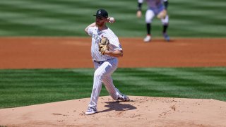 Starting pitcher Jon Gray #55 of the Colorado Rockies delivers to home plate during the first inning against the Texas Rangers at Coors Field on Aug. 16, 2020 in Denver, Colorado.