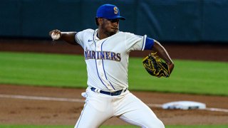 Starter Justin Dunn #35 of the Seattle Mariners delivers a pitch during the first inning of a game against the Texas Rangers at T-Mobile Park on Aug. 23, 2020 in Seattle, Washington.