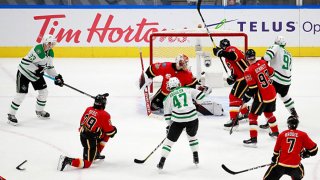 Cam Talbot #39 of the Calgary Flames gives up the game winning goal to John Klingberg (not pictured) #3 of the Dallas Stars during overtime in Game Four of the Western Conference First Round during the 2020 NHL Stanley Cup Playoffs at Rogers Place on Aug. 16, 2020 in Edmonton, Alberta, Canada.