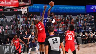 Tim Hardaway Jr. #11 of the Dallas Mavericks dunks the ball against the Houston Rockets on July 31, 2020 at The Arena at ESPN Wide World Of Sports Complex in Orlando, Florida.