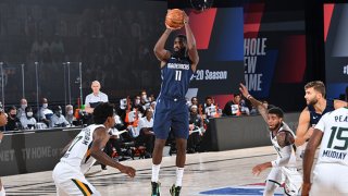 Tim Hardaway Jr. #11 of the Dallas Mavericks shoots the ball against the Utah Jazz on August 10, 2020 at Visa Athletic Center at the AdventHealth Arena at in Orlando, Florida.