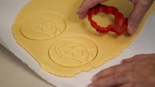 Julie Muller, who sells cookie decorating kits on Etsy, makes cutout cookies with the likeness of President Obama