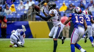 Baltimore Ravens defensive back Brandon Carr (24) intercepts the football thrown by Buffalo Bills quarterback Nathan Peterman (2) during the game between the Buffalo Bills and the Baltimore Ravens on Sept. 9, 2018, at M&T Bank Stadium in Baltimore, MD. The Ravens defeated the Bills, 47-3.