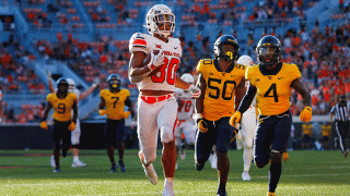 Running back Chuba Hubbard #30 of the Oklahoma State Cowboys runs into the end zone for a 23-yard touchdown against the West Virginia Mountaineers in the fourth quarter on Sept. 26, 2020 at Boone Pickens Stadium in Stillwater, Oklahoma. Hubbard had 101 yards. OSU won 27-13.