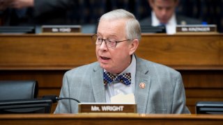 Rep. Ron Wright, R-Texas, takes his seat for the House Foreign Affairs Committee hearing on "NATO at 70: An Indispensable Alliance" on Wednesday, March 13, 2019.