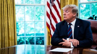 President Donald J. Trump speaks in the Oval Office as Guatemala signs a safe third country agreement to restrict asylum applications to the U.S. from Central America at the White House on Friday, July 26, 2019 in Washington, DC.