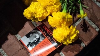 A flyer detailing the lynching of Emmett Till is seen here during a protest against police brutality and racial injustice on August 28, 2020 in Portland, Oregon. Friday marked the 93rd night of protests in Portland following the death of George Floyd.