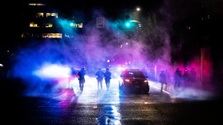 Portland police disperse a crowd on September 23, 2020 in Portland, United States