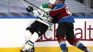 Gabriel Landeskog #92 of the Colorado Avalanche checks Joe Pavelski #16 of the Dallas Stars during the first period of Game Five of the Western Conference Second Round during the 2020 NHL Stanley Cup Playoffs at Rogers Place on August 31, 2020 in Edmonton, Alberta.