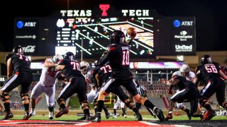 Quarterback Alan Bowman #10 of the Texas Tech Red Raiders passes the ball during the second half of the college football game against the Houston Baptist Huskies on September 12, 2020 at Jones AT&T Stadium in Lubbock, Texas.