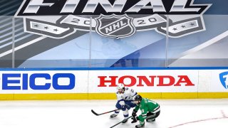 Brayden Point #21 of the Tampa Bay Lightning battles for the puck with Jason Dickinson #18 of the Dallas Stars during the second period in Game Three of the 2020 NHL Stanley Cup Final at Rogers Place on September 23, 2020 in Edmonton, Alberta, Canada.