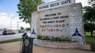FORT HOOD, TX - JUNE 03: Media outlets gather outside the Bernie Beck gate at Fort Hood on June 3, 2016 in Fort Hood, Texas. The media were hoping for more information on drowning casualties and missing soldiers during training at the army base that occurred June 2.