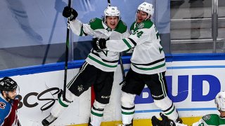 Joel Kiviranta #25 of the Dallas Stars is congratulated by his teammates after scoring a goal against the Colorado Avalanche during the third period in Game Seven of the Western Conference Second Round during the 2020 NHL Stanley Cup Playoffs at Rogers Place on Sept. 4, 2020 in Edmonton, Alberta, Canada.