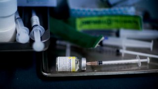 In this Oct. 2, 2015, file photo, a syringe sits in a bottle of Ketamine inside the operating room at the Pratunam Polyclinic in Bangkok, Thailand.