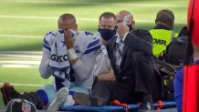 Dallas Cowboys quarterback Dak Prescott is carted off the field after injuring his right ankle against the New York Giants at AT&T Stadium in Arlington, Texas on Sunday, Oct. 11, 2020.