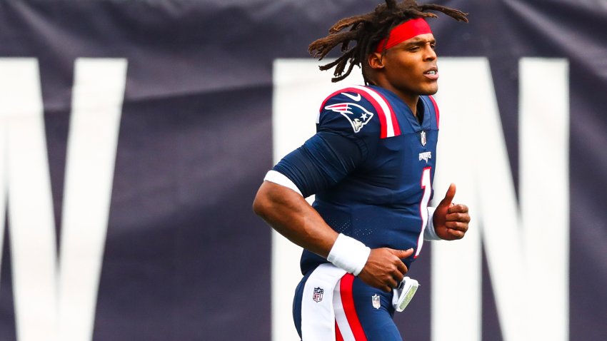 FOXBOROUGH, MASSACHUSETTS – SEPTEMBER 27: Cam Newton #1 of the New England Patriots runs onto the field before a game against the Las Vegas Raiders at Gillette Stadium on September 27, 2020 in Foxborough, Massachusetts. (Photo by Adam Glanzman/Getty Images)